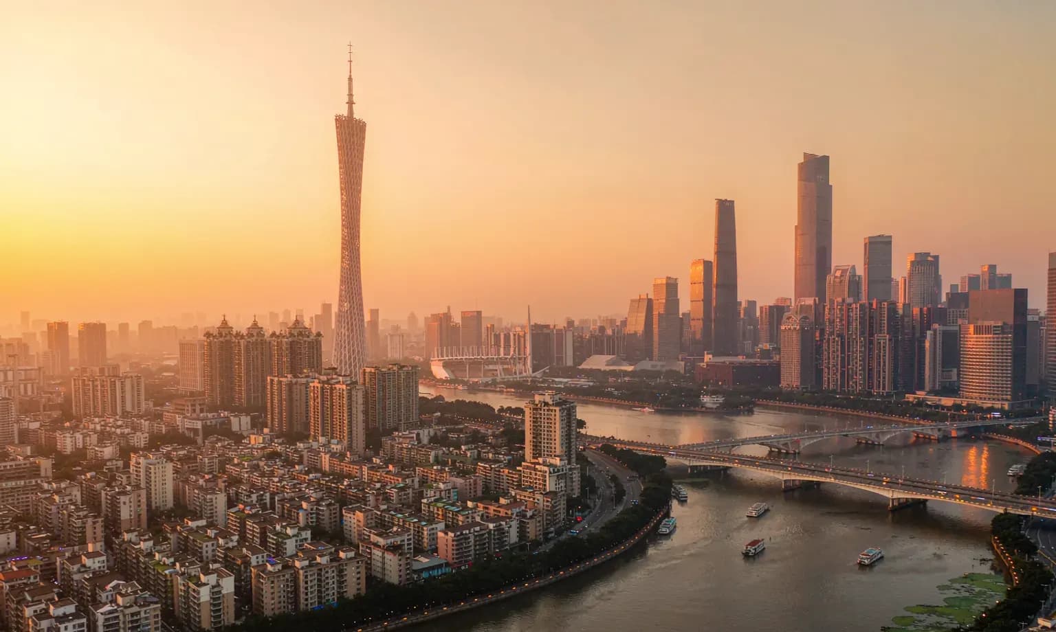 Canton Tower and the Pearl River waterfront in Guangzhou at dusk